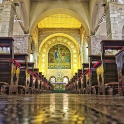 A Group Of People Standing In Front Of A Building